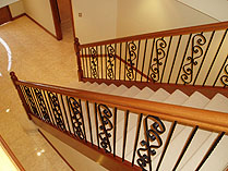 Rossmore Carpentry - Solid Brushbox Staircase with Wrought Iron Inserts